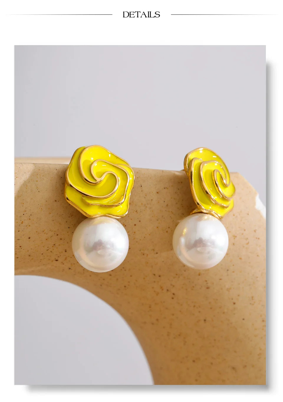 White pearl enamel earrings in gold-plated stainless steel with pearl and enamel.