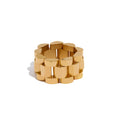 Geometric chain ring in gold-plated stainless steel.