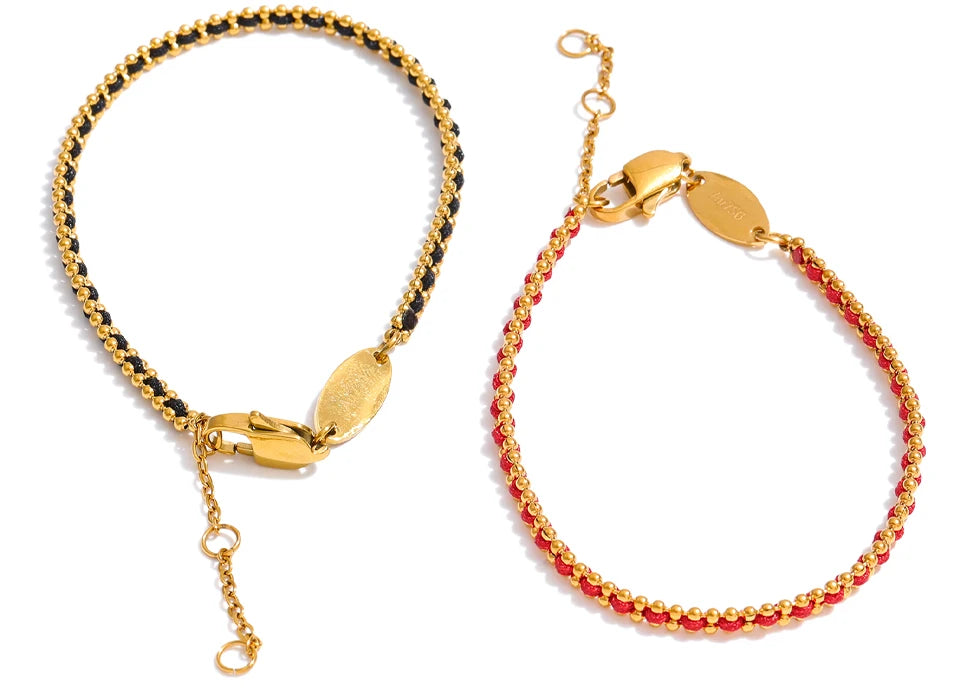 Black geometric chain necklace in gold-plated stainless steel.