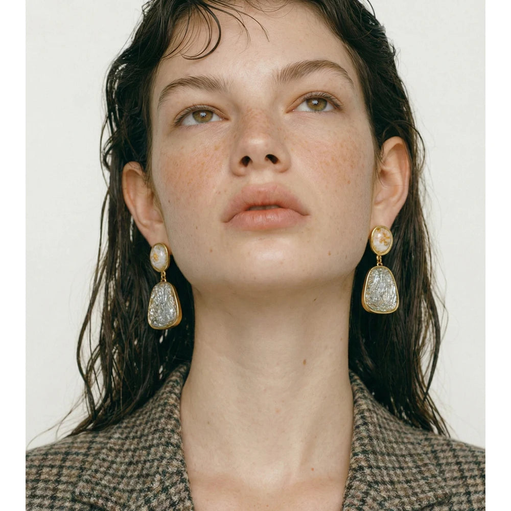 White resin multi-color earrings in gold-plated stainless steel with resin.