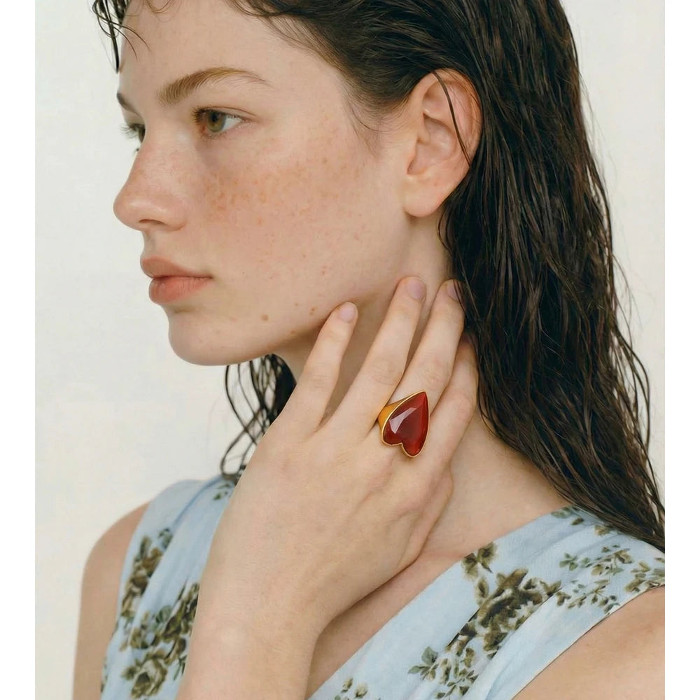 Red natural stone heart ring in 18K gold-plated stainless steel with natural stone.
