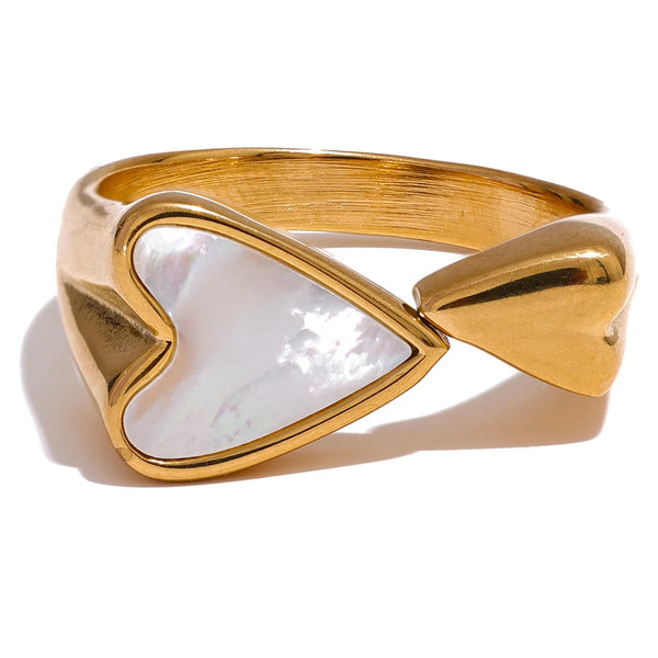 Gold-plated stainless steel ring with shell and acrylic design.