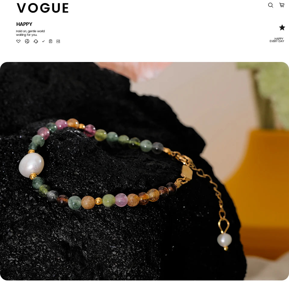 Pearl natural stone beaded bracelet in gold-plated stainless steel with pearl and natural stone.