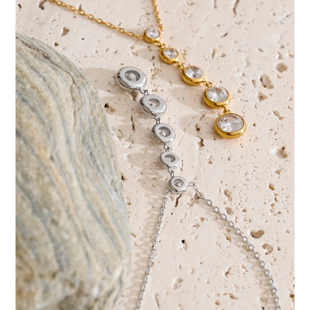 Cubic zirconia geometric chain necklace in gold-plated stainless steel with cubic zirconia.