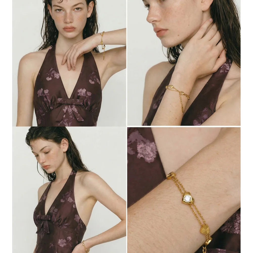 Cubic zirconia heart chain necklace in gold-plated stainless steel with cubic zirconia.