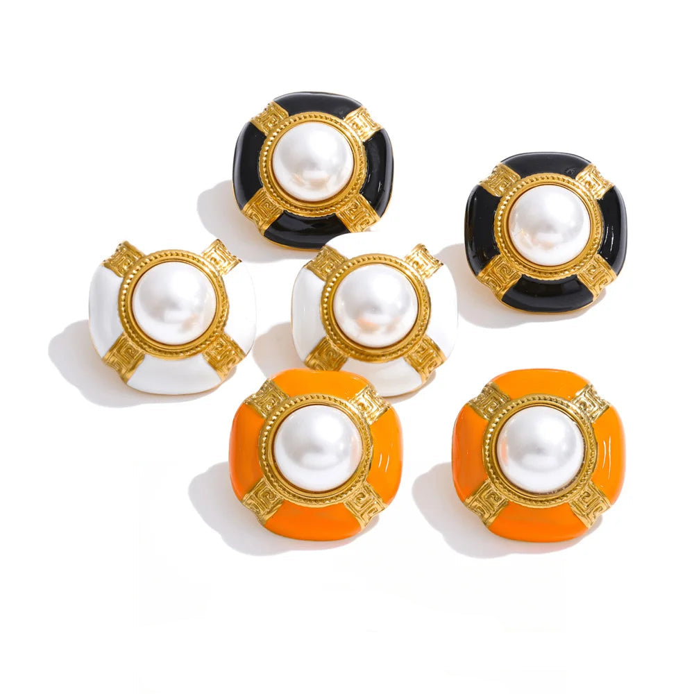 Earrings made of gold-plated stainless steel with pearl and enamel.