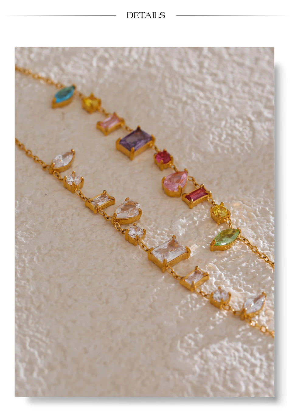 White cubic zirconia multi-color necklace in gold-plated stainless steel with cubic zirconia.
