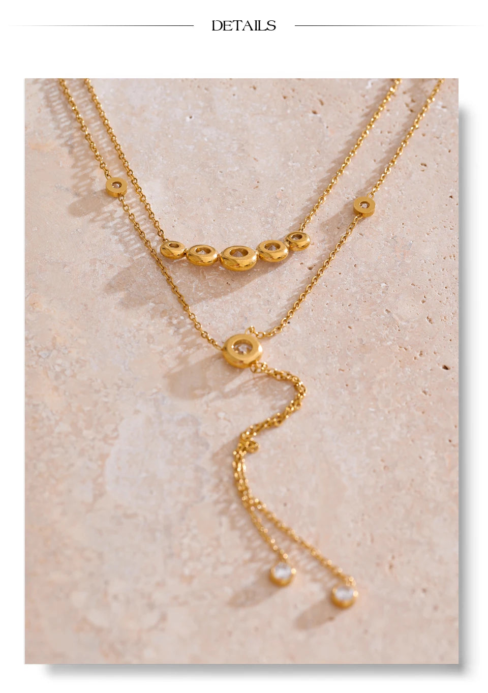 Cubic zirconia geometric chain necklace in gold-plated stainless steel with cubic zirconia.