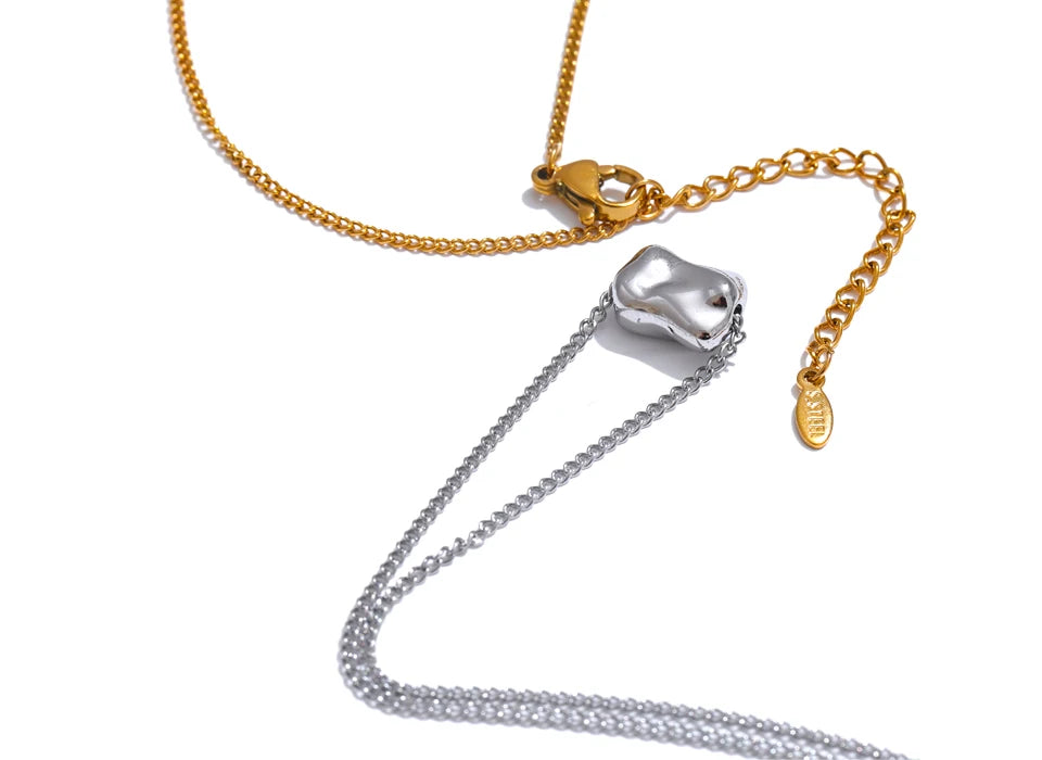 Hammered geometric necklace in gold-plated stainless steel.