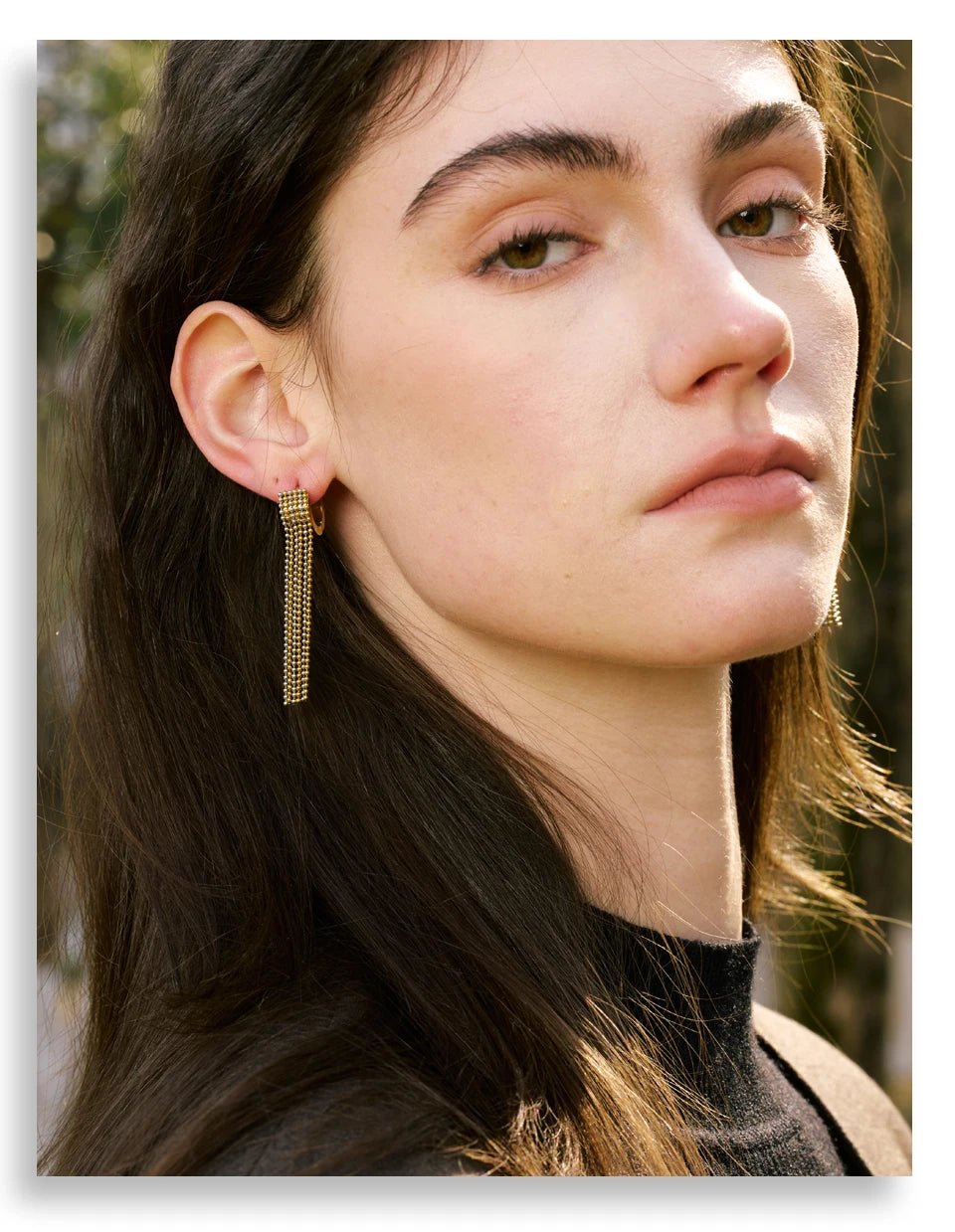 Geometric chain earrings in gold-plated stainless steel.