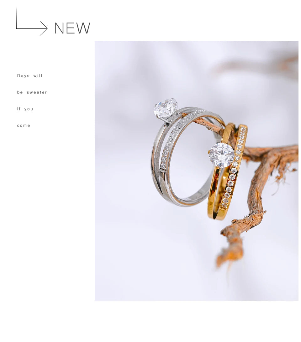 Cubic zirconia geometric layered ring in gold-plated stainless steel with cubic zirconia.
