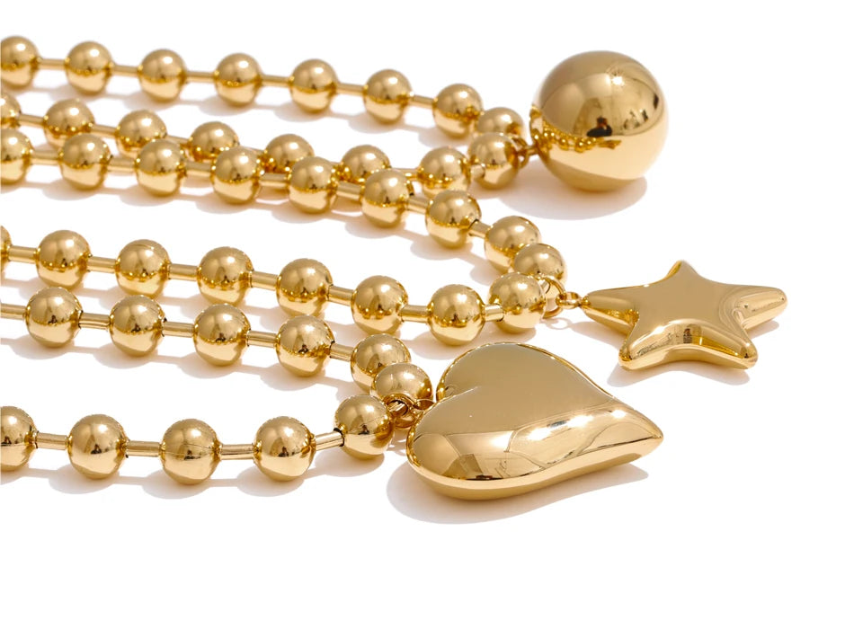 Heart star beaded necklace in gold-plated stainless steel.