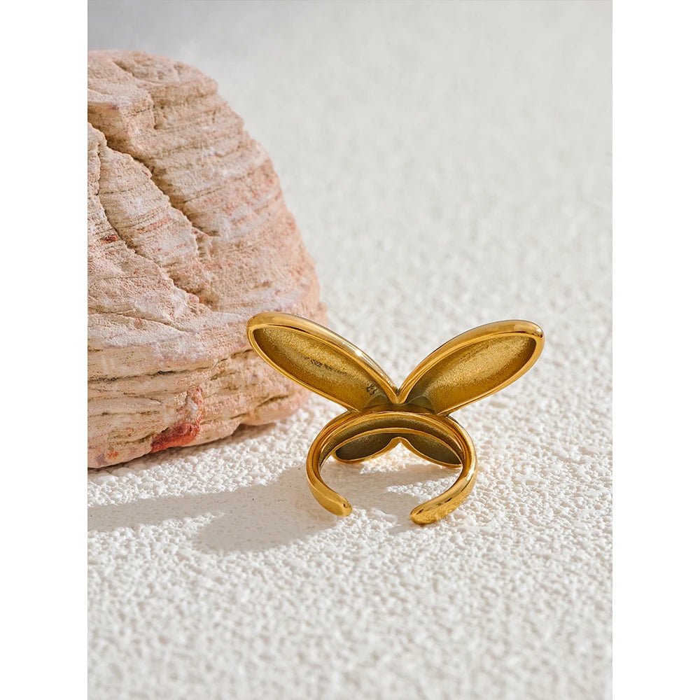 Butterfly minimalist geometric ring in 18K gold-plated 316L stainless steel.