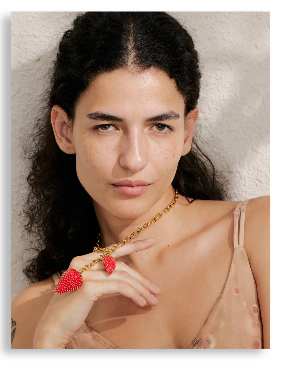 Red heart geometric necklace in gold-plated stainless steel.