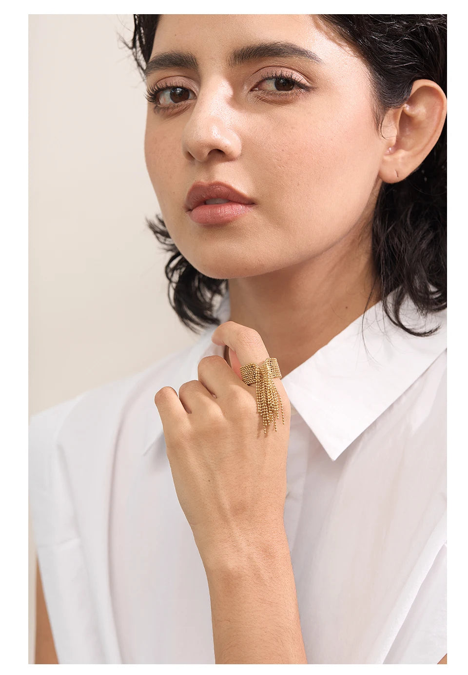 Geometric chain ring in 18K gold-plated stainless steel.