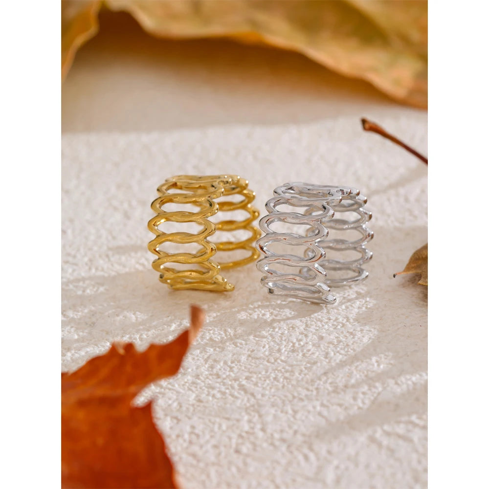 Geometric ring in gold-plated stainless steel.