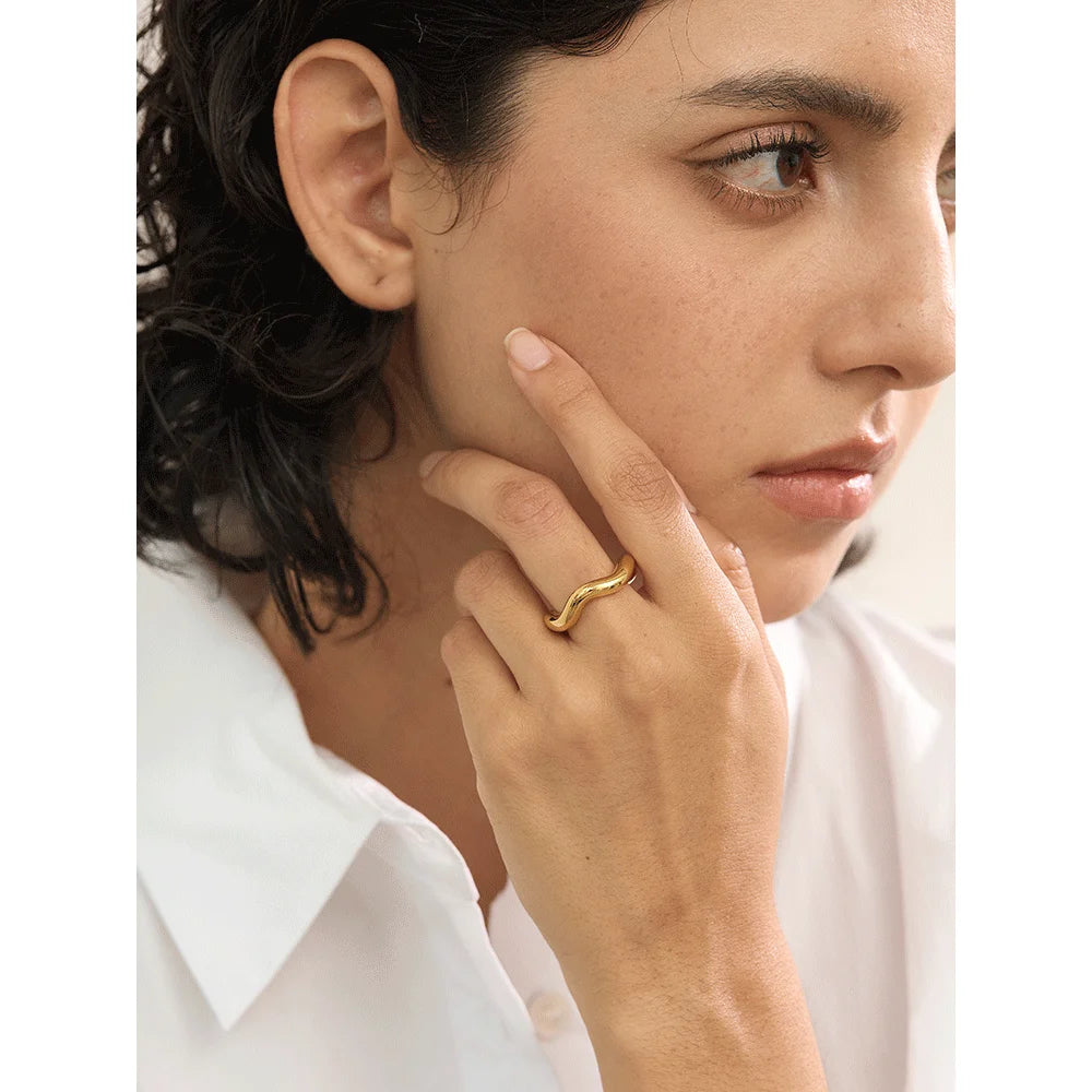 Geometric ring in 18K gold-plated stainless steel.