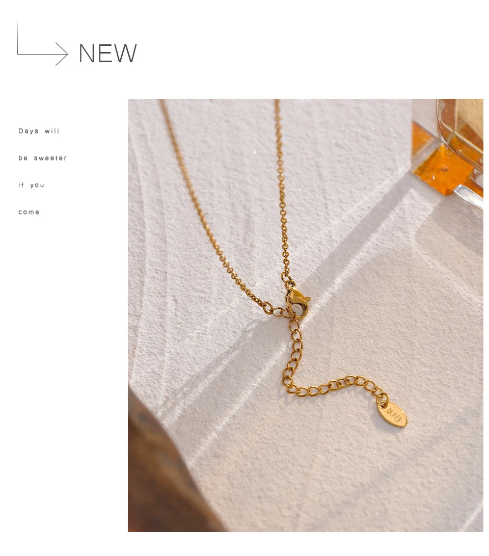 Sun geometric necklace in gold-plated stainless steel.