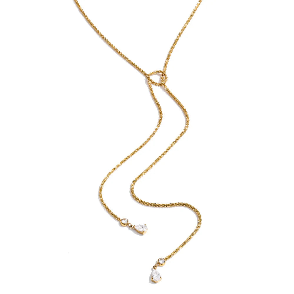 Cubic zirconia geometric chain necklace in gold-plated stainless steel with cubic zirconia.