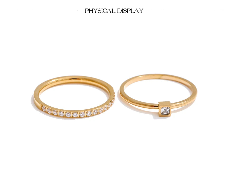 Cubic zirconia geometric ring in 18K gold-plated stainless steel with cubic zirconia.