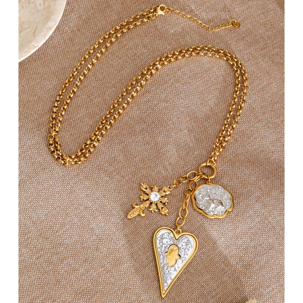 Heart cross necklace in gold-plated stainless steel.