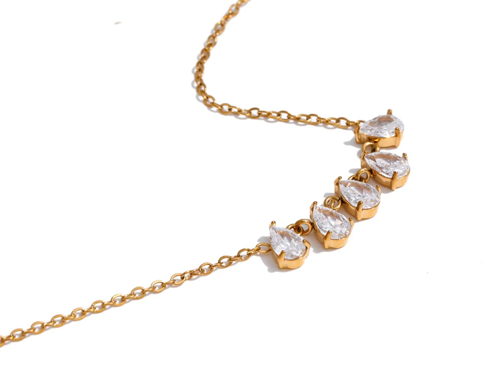 Cubic zirconia geometric necklace in gold-plated stainless steel with cubic zirconia.