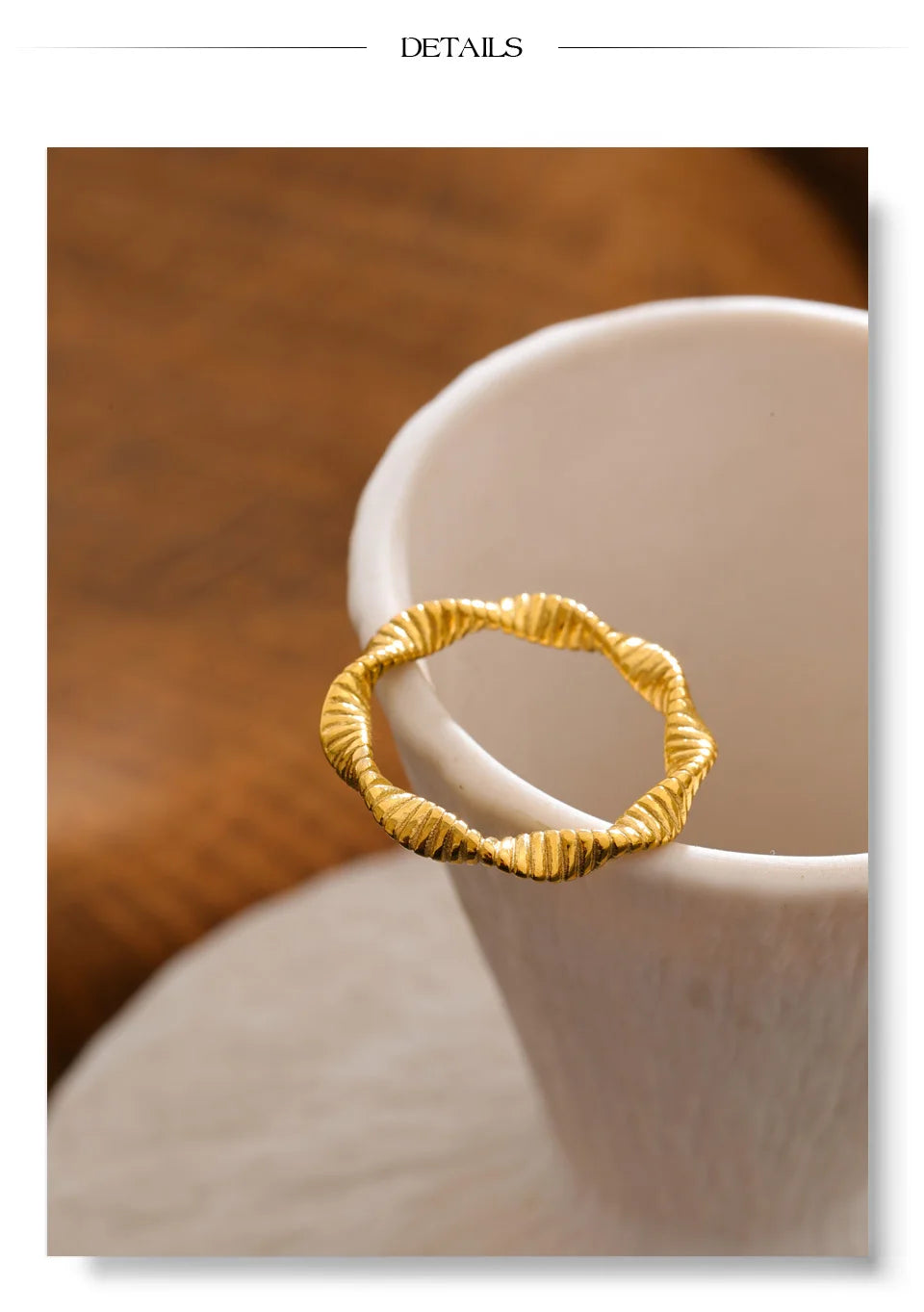 Geometric ring in 18K gold-plated stainless steel.