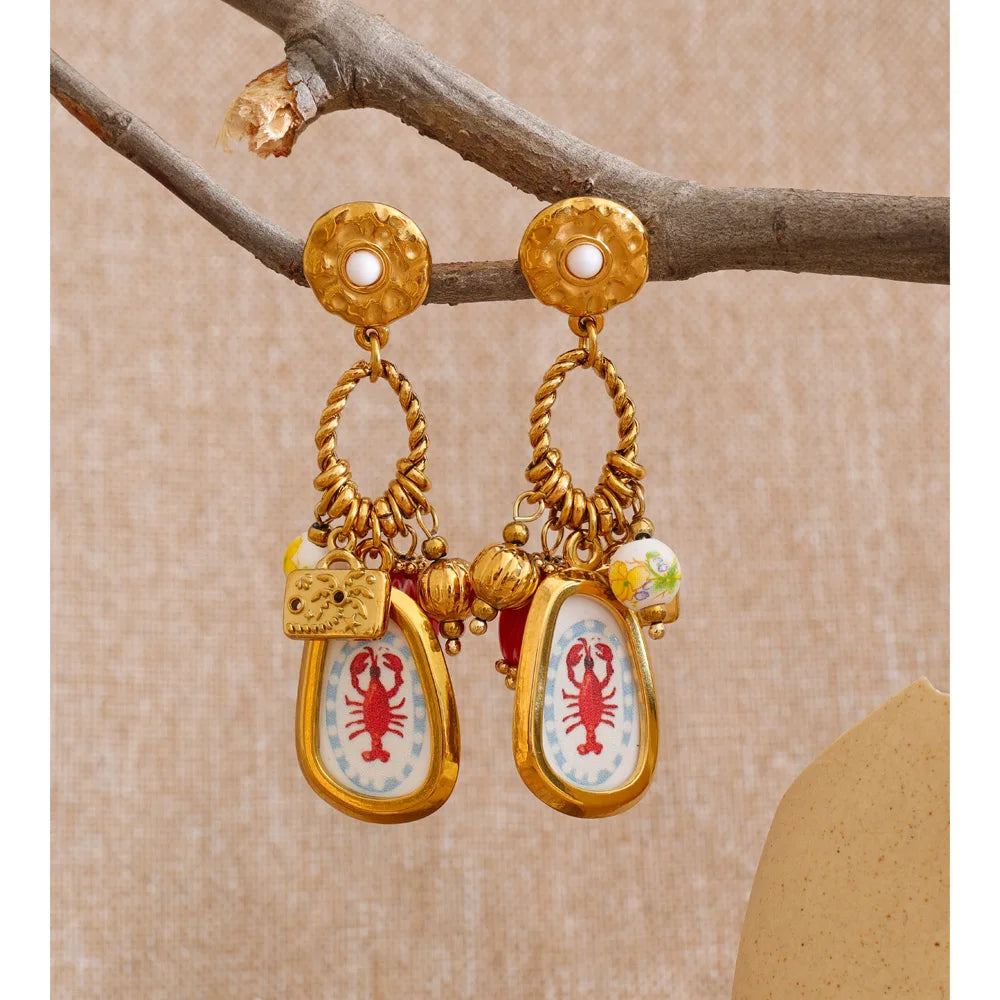 Geometric earrings in gold-plated stainless steel.