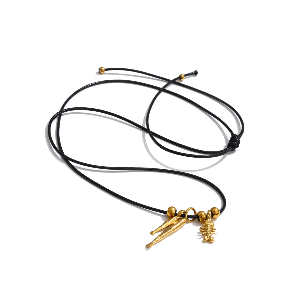 Geometric chain necklace in gold-plated stainless steel.