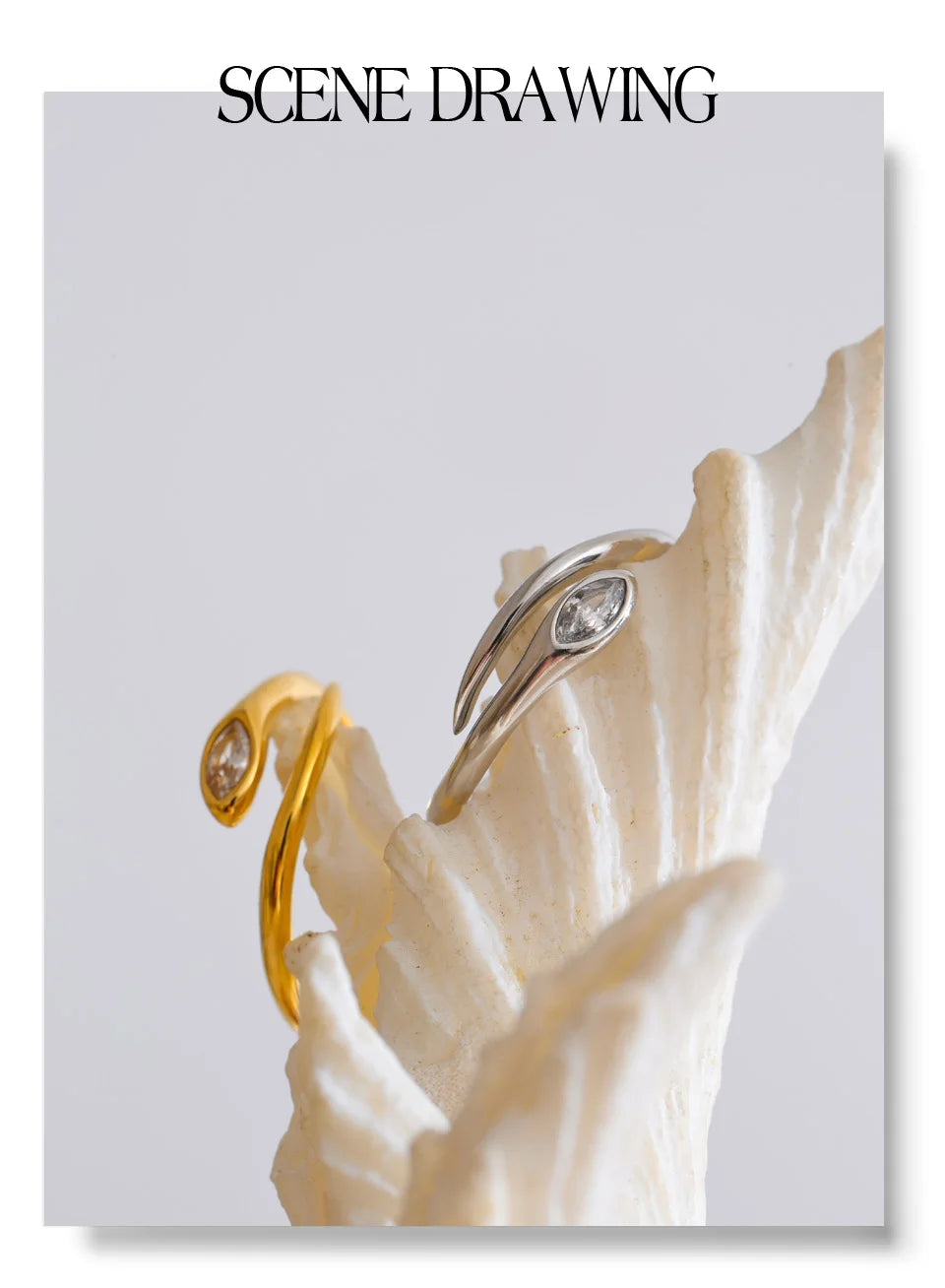Cubic zirconia snake geometric ring in 18K gold-plated stainless steel with cubic zirconia.