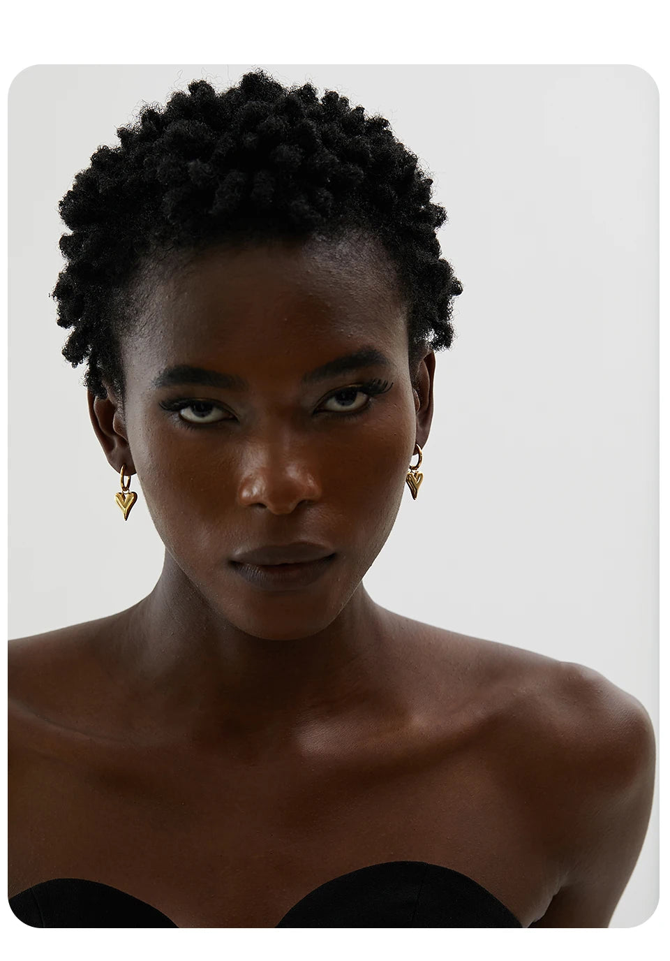 Heart earrings in gold-plated stainless steel.