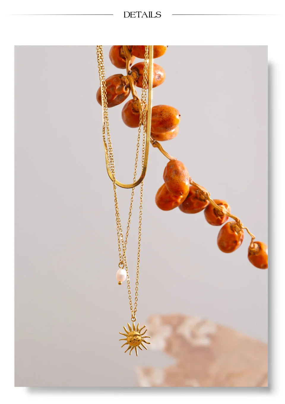 Freshwater pearl sun geometric necklace in gold-plated stainless steel with freshwater pearl.