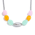 Resin natural stone geometric necklace in gold-plated stainless steel with natural stone and resin.