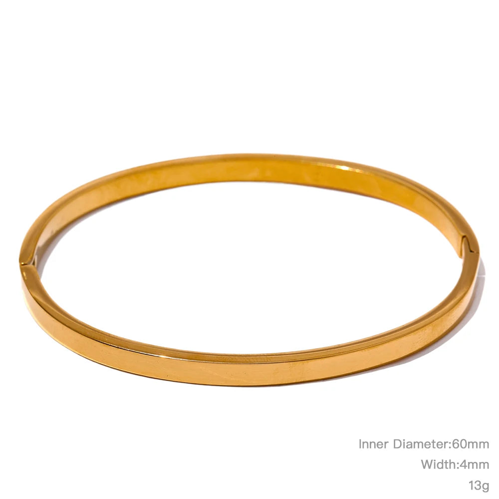 Geometric bracelet in gold-plated stainless steel.