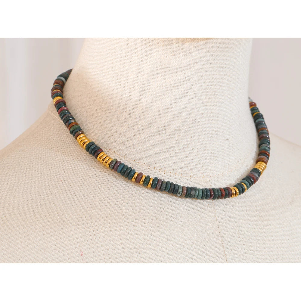 Natural stone beaded multi-color necklace in gold-plated stainless steel with natural stone.