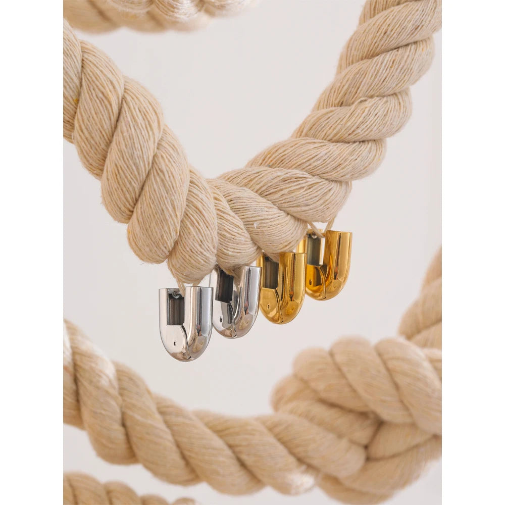 Geometric earrings in gold-plated 316L stainless steel.