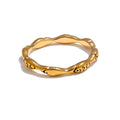 Minimalist geometric ring in 18K gold-plated stainless steel.