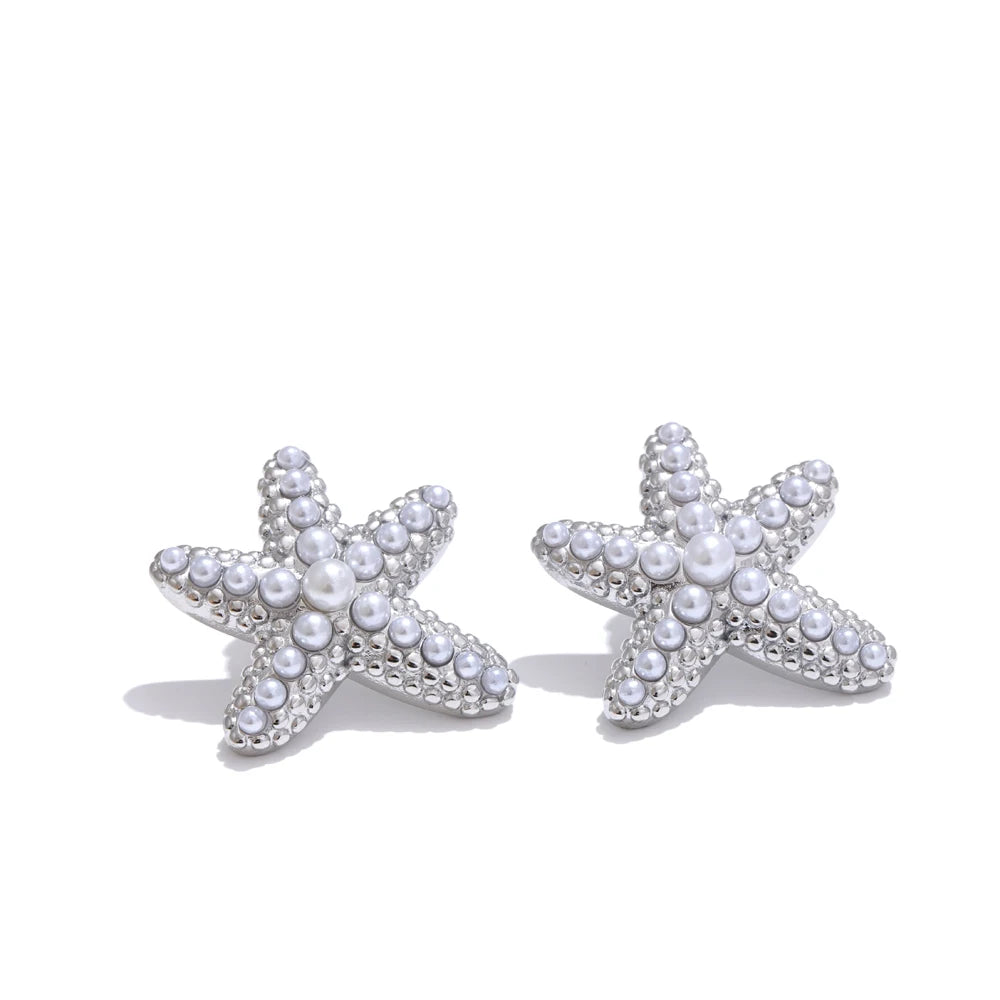 Pearl star earrings in gold-plated stainless steel with pearl.