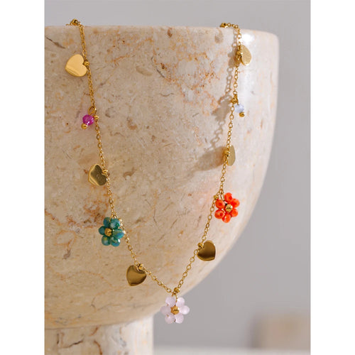 Crystal flower necklace in gold-plated stainless steel with crystal.