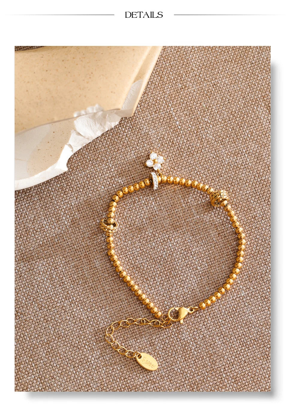 Cubic Zirconia Flower Beaded Bracelet — Gold-Plated Stainless Steel with Cubic Zirconia · PS1066