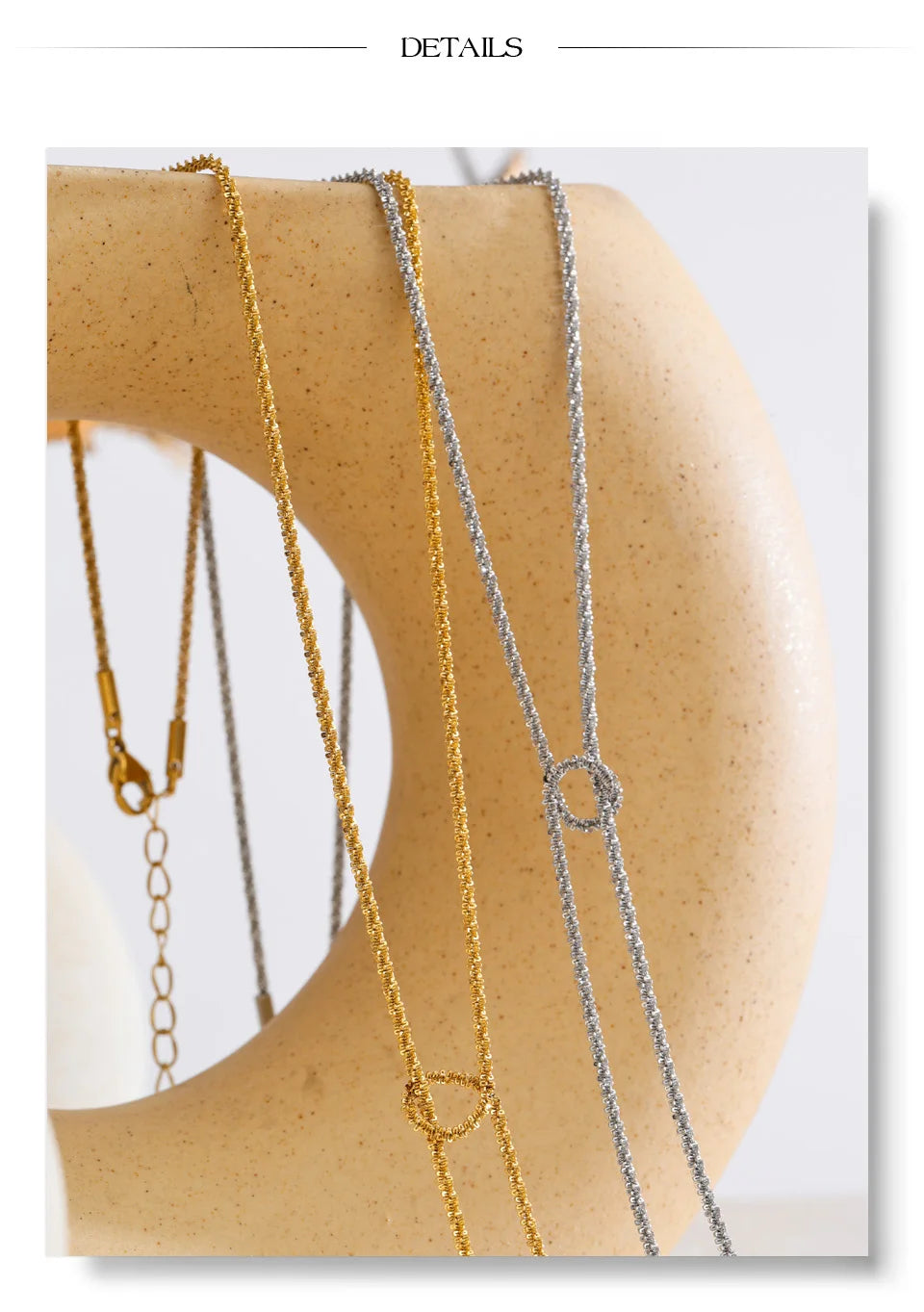 Cubic zirconia geometric chain necklace in gold-plated stainless steel with cubic zirconia.
