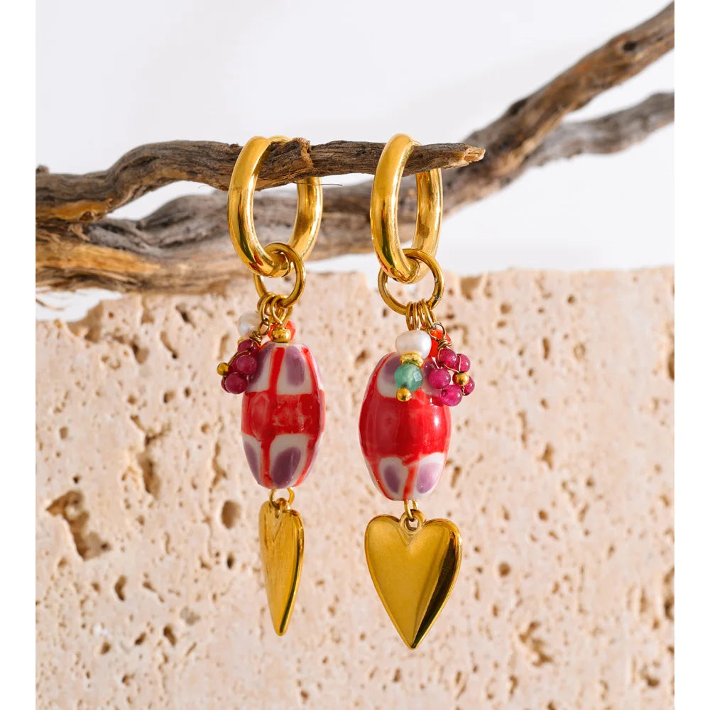 Red heart earrings in gold-plated stainless steel.