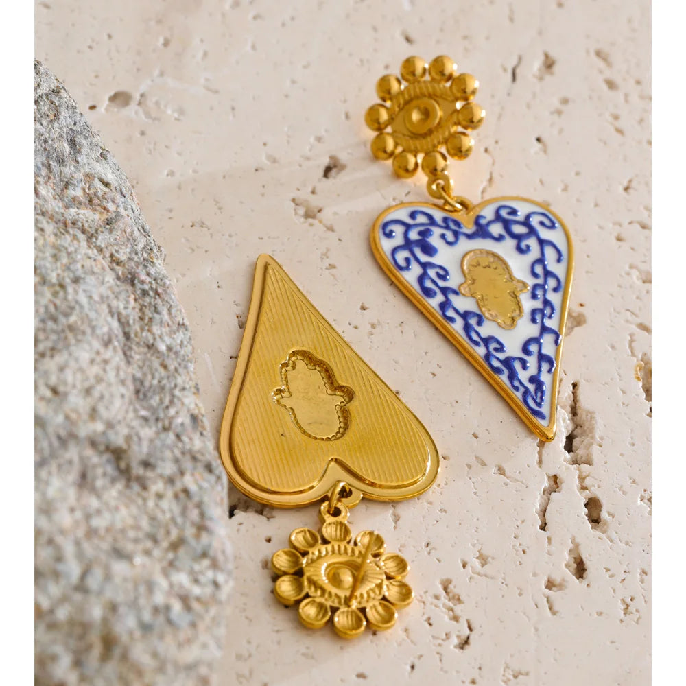 Blue enamel heart earrings in gold-plated stainless steel with enamel.