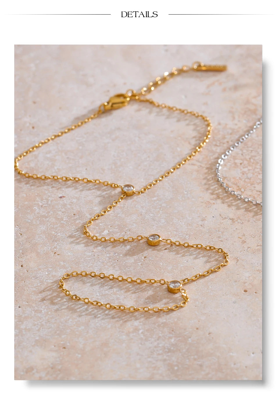 Cubic zirconia geometric chain necklace in gold-plated stainless steel with cubic zirconia.