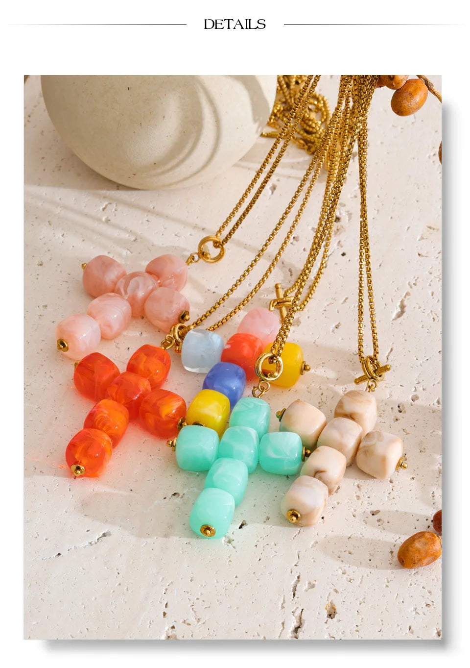 Resin acrylic cross necklace in gold-plated stainless steel with resin and acrylic.