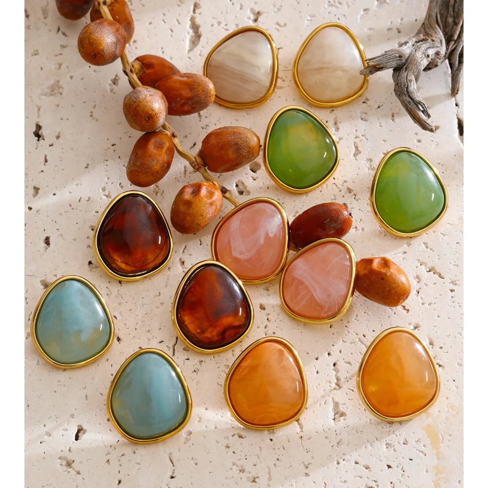 Resin acrylic multi-color earrings in gold-plated stainless steel with resin and acrylic.