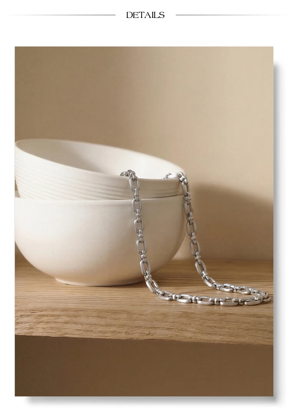 Geometric chain necklace in gold-plated stainless steel.