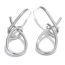 Geometric earrings in gold-plated stainless steel.