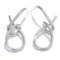 Geometric earrings in gold-plated stainless steel.