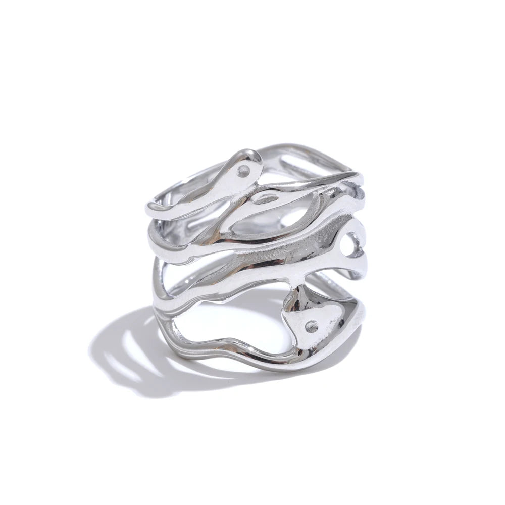Geometric layered ring in gold-plated 316L stainless steel.